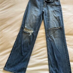 High-Rise Wide-Leg Distressed Jeans in Medium Blue